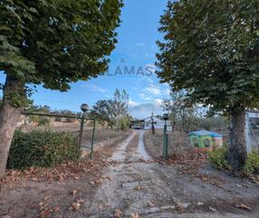 Mas à Talayuela. Parcela con casa y nave en finca "la barquilla"
