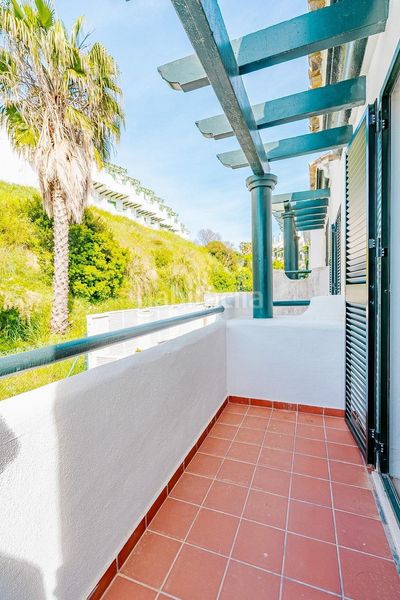 Foto 518f2d97-7538-4396-bef7-ade006fc2456. Casa aparellada amb calefacció aparcament a El Castillo Manilva