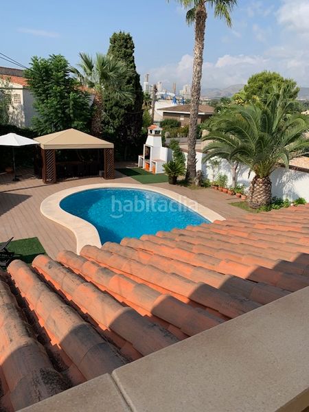 Foto 5645e0a7-5ed1-40ff-a2e4-56237e28c66d. Xalet amb xemeneia calefacció aparcament piscina a Benidorm