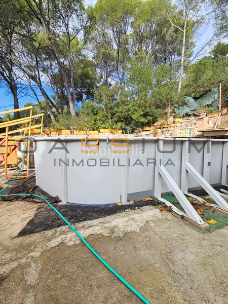 Foto c119ac68-aab5-4dfc-83d5-9c3e942b9f34. Casa amb xemeneia aparcament piscina a Bellvei