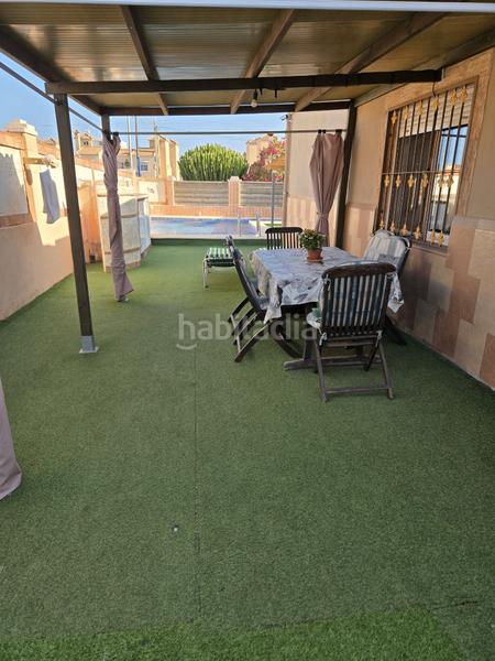 Foto 6911c16c-f864-4d1e-8dc0-5dcacf654eba. Chalet en calle del morral 218 chalet adosado en playa flamenca, costa en Orihuela