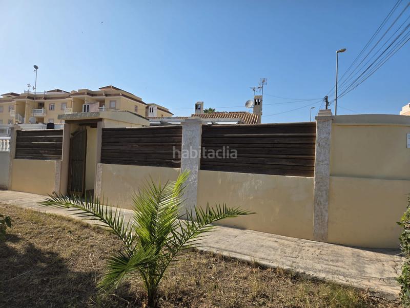 Foto 701fd8e4-83d5-47ed-a764-255ff5e2bc87. Chalet en calle del morral 218 chalet adosado en playa flamenca, costa en Orihuela