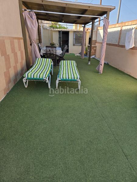 Foto 72fb56b8-d59d-438a-b51d-8639f4faf9d6. Chalet en calle del morral 218 chalet adosado en playa flamenca, costa en Orihuela