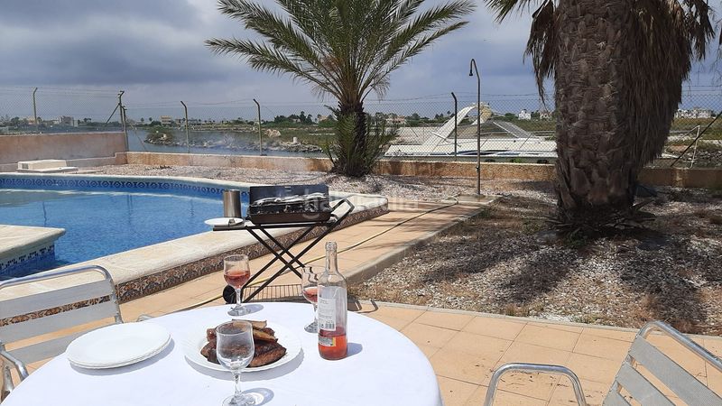 Foto 41f93e84-7cda-4764-b2b5-38d5070f1fe7. Chalet en urbanización Veneziola golf 125 chalet en la manga, murcia, con puerto de atraque en Manga del Mar Menor (La)