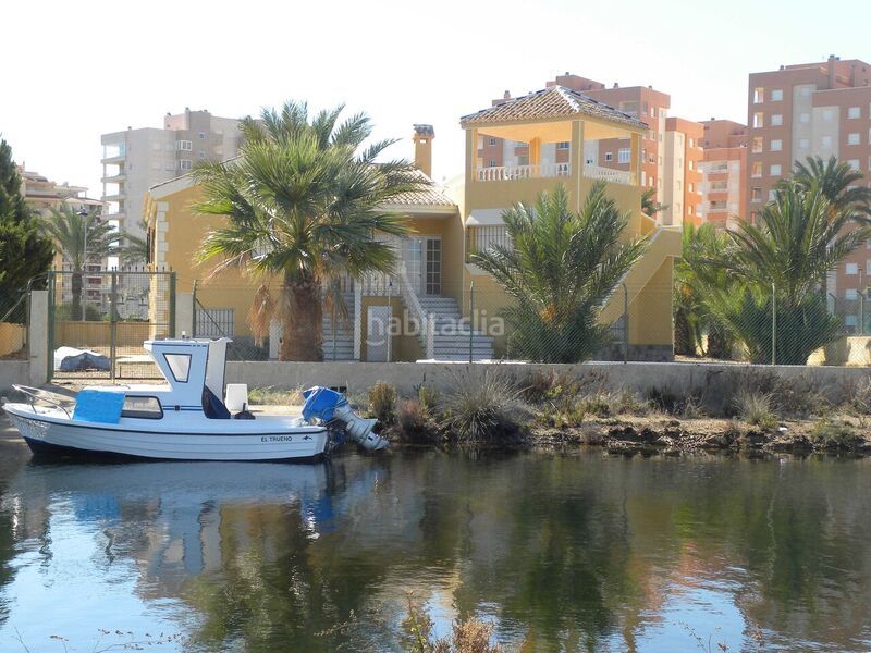 Foto 8302ab72-4e9b-437b-9fd6-5c866d4861c0. Chalet en urbanización Veneziola golf 125 chalet en la manga, murcia, con puerto de atraque en Manga del Mar Menor (La)