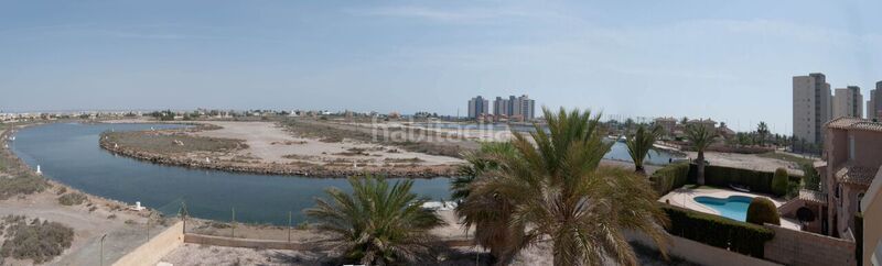 Foto d3c5e621-0af8-48d4-8b51-4f72214706e7. Chalet en urbanización Veneziola golf 125 chalet en la manga, murcia, con puerto de atraque en Manga del Mar Menor (La)