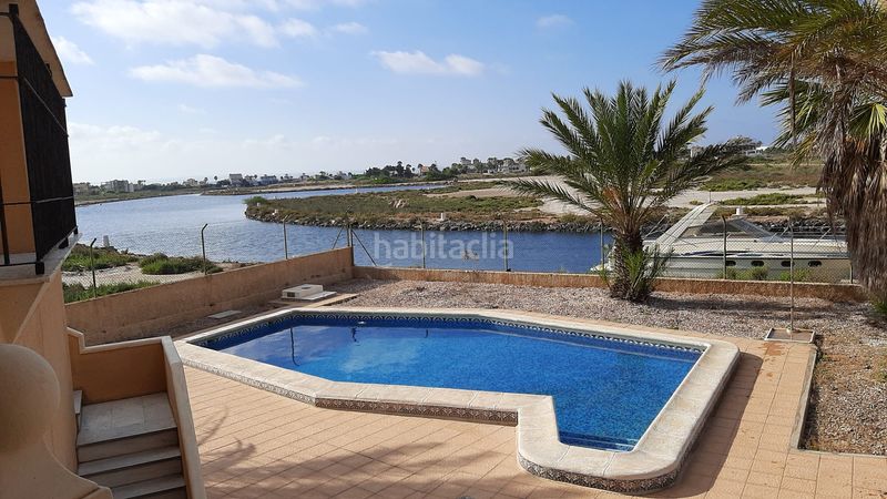 Foto e82e346f-3ea5-44c4-9d47-919f0fbf885e. Chalet en urbanización Veneziola golf 125 chalet en la manga, murcia, con puerto de atraque en Manga del Mar Menor (La)