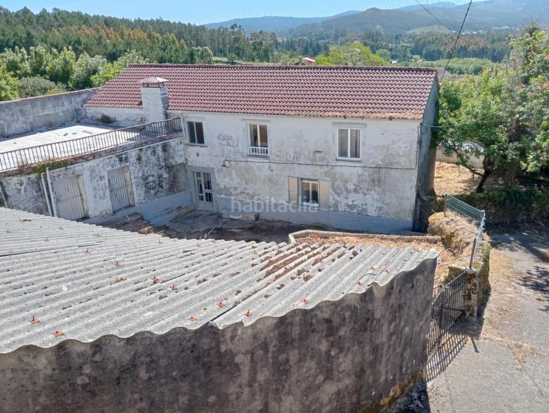 Foto cf5aad3d-296d-4f98-8353-51cc23a1c62d. Casa amb aparcament a Camariñas