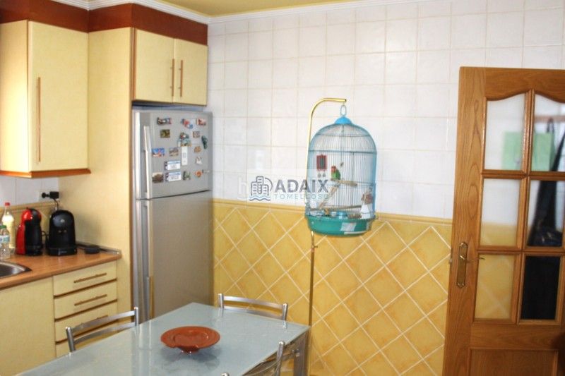 Foto 7358fa6c-c50d-4fd0-8530-ba2c6ad5c3bd. Casa adossada amb calefacció aparcament a Tomelloso