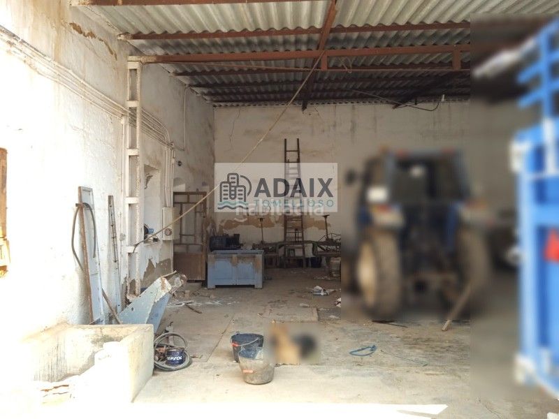 Foto 883e8e7c-fb6b-410d-8129-3688801b798d. Casa amb aparcament a Tomelloso