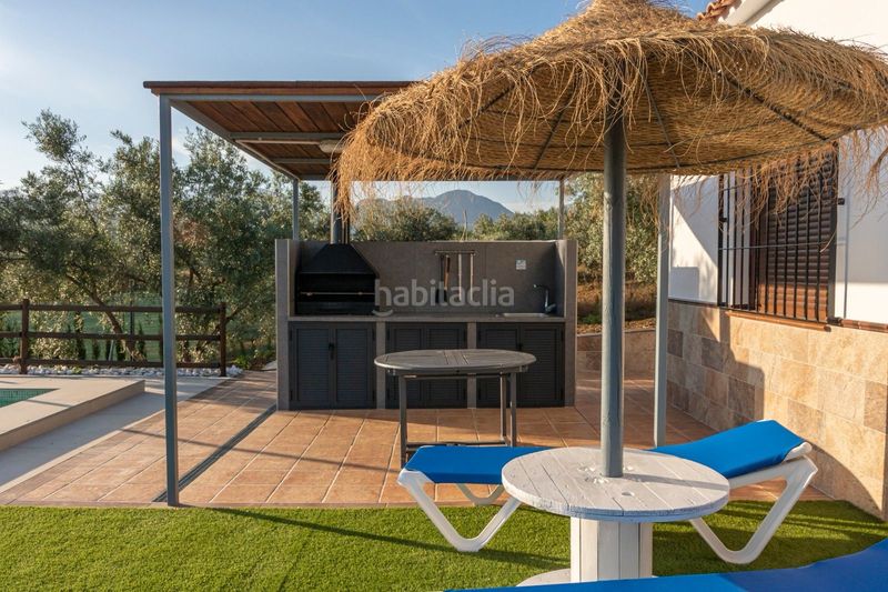 Foto 0d35ac34-b0dd-4118-bde0-20ee83e3c061. Masia amb xemeneia calefacció aparcament piscina a Periana