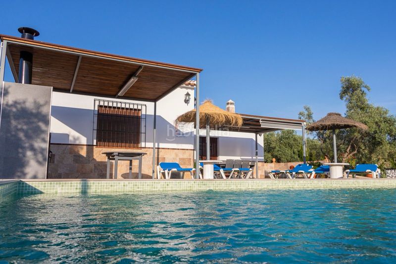 Foto 34050cf2-5cca-420a-846c-e6754b2a144d. Masia amb xemeneia calefacció aparcament piscina a Periana