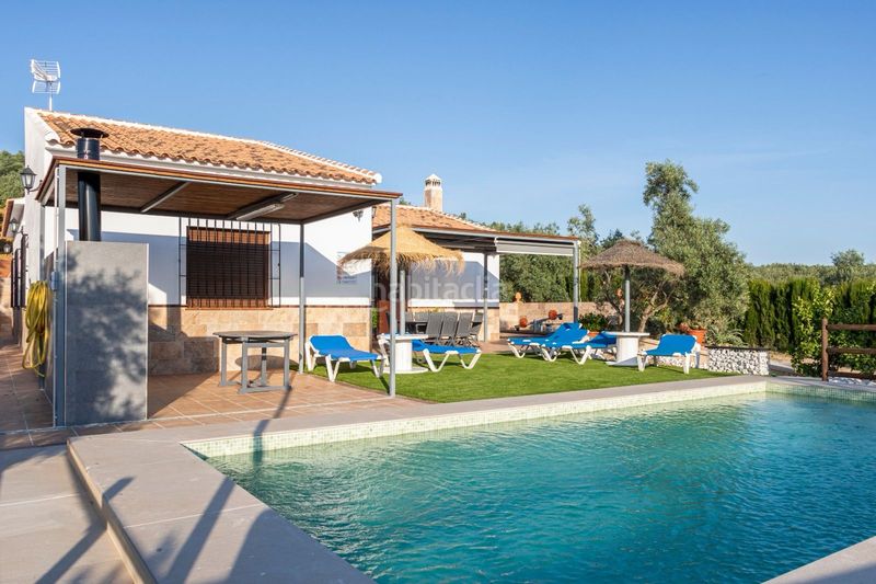 Foto d4c127fa-685e-462b-a8cf-14865092e7d7. Masia amb xemeneia calefacció aparcament piscina a Periana