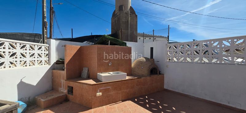 Foto 6fdbd936-a6be-43ae-90e6-60c671b1c79a. Casa aparellada amb aparcament a Almayate Bajo