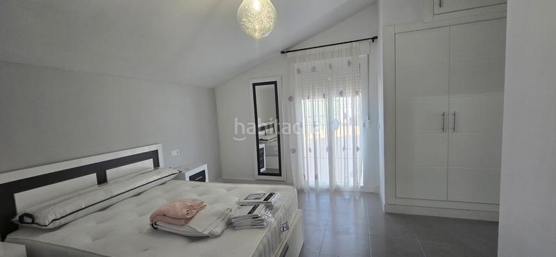 Foto 998a34a7-dd16-42ce-b2f1-c5a846198e56. Casa aparellada amb aparcament a Almayate Bajo