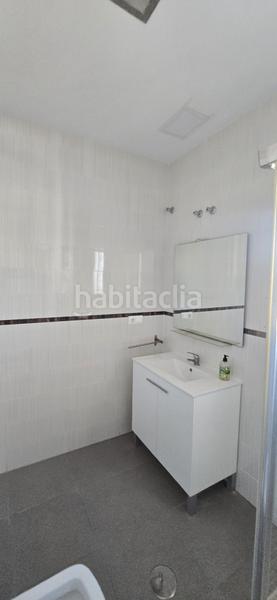 Foto abce63cc-5dc9-427c-8962-6331de918f14. Casa aparellada amb aparcament a Almayate Bajo