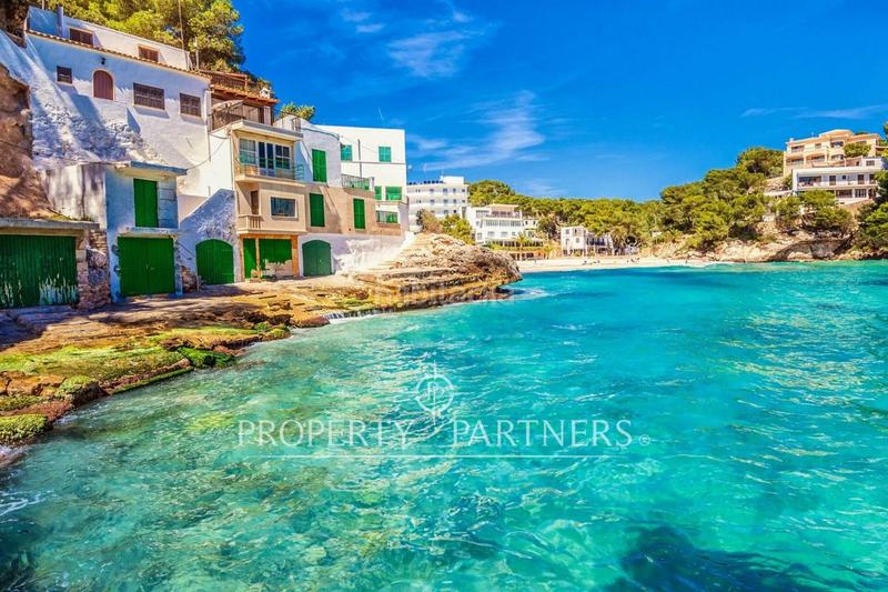Foto f42b92da-99bf-4519-a0c1-497add34e074. Casa aparellada amb aparcament a cala Santanyí Santanyí