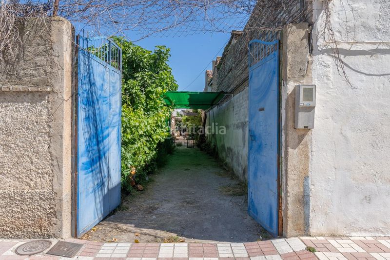Foto cc501c30-6096-4281-85c3-6be59f6398c6. Casa en calle camino de ullar 10 venta de amplia casa con terreno granada en Santa Fe