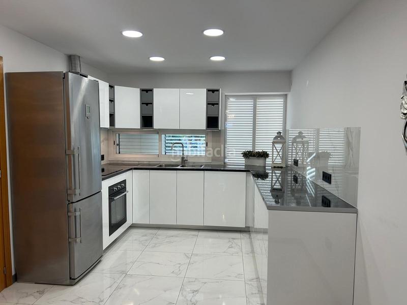 Foto df0d9eb9-2a40-40d3-94df-24a91b6e84c8. Semi detached house with parking in Playa Fañabé Alto Adeje