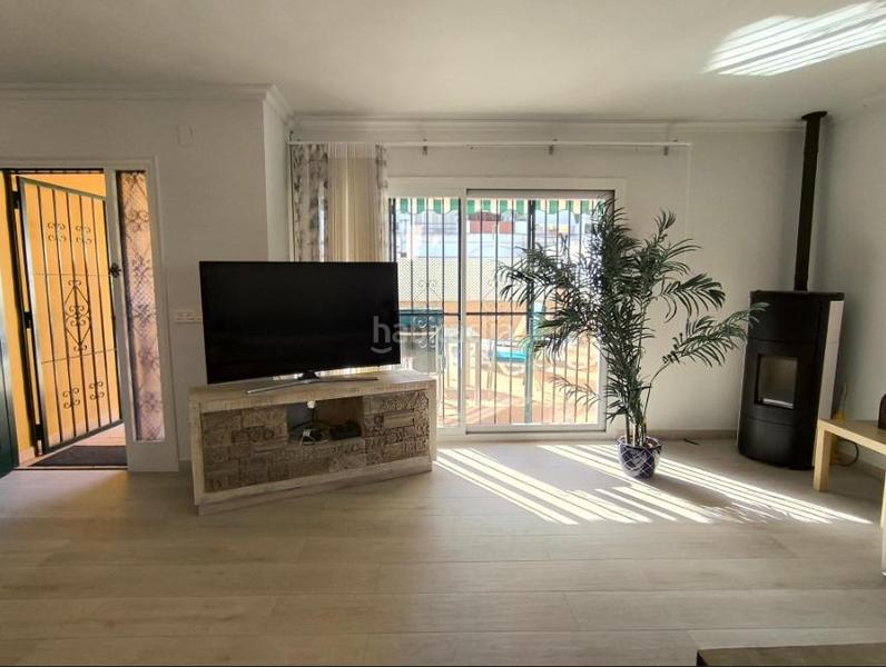 Foto 57a84c1c-d969-4ccb-923e-e25f547fea76. Casa a schiera con riscaldamento parcheggio piscina in Alfàs del Pi (l´)