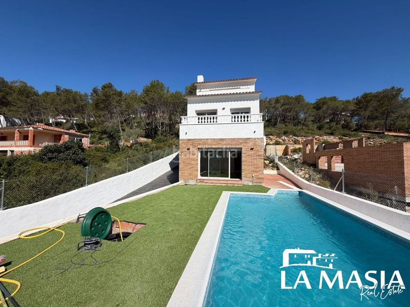 Foto c3042771-3114-41cf-ad9f-58600a4289ac. Casa amb piscina a Olivella