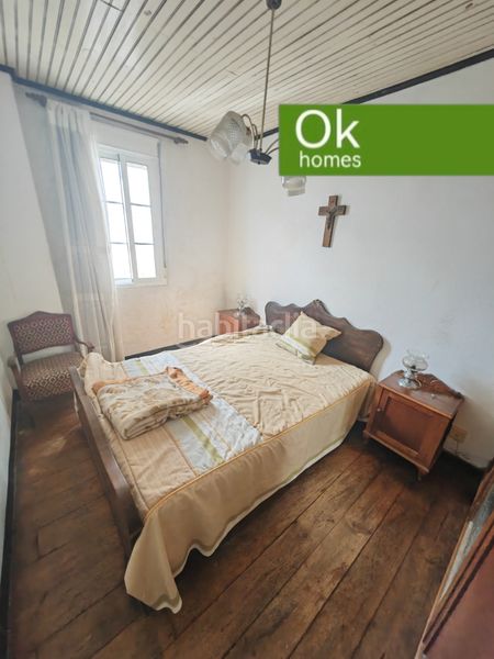 Foto e3b63a98-e3ea-420e-b902-2e9e6faf571a. Casa adossada a Arzúa