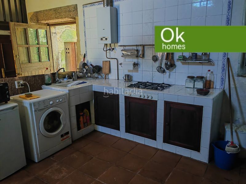 Foto 6c0a5e86-e155-486b-b767-2ae42a3384a0. Masia amb xemeneia calefacció aparcament a Aranga