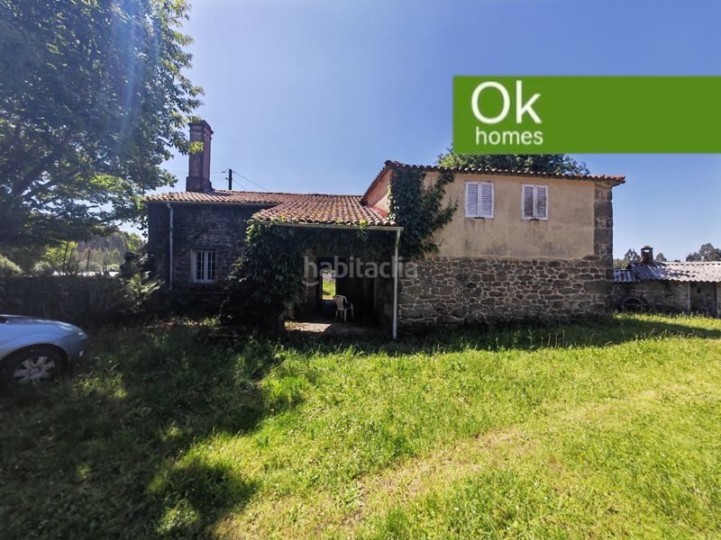 Foto e94af417-3eb0-4347-96a8-b951513a44f6. Masia amb xemeneia calefacció aparcament a Aranga