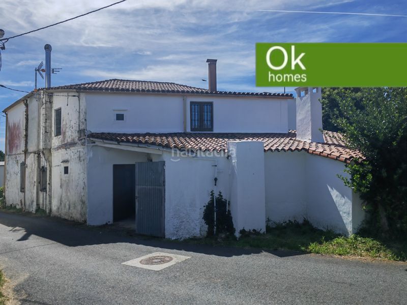 Foto 4c675442-ea6f-4639-80f3-0ec4dcbf0349. Casa adossada amb xemeneia aparcament a Boimorto