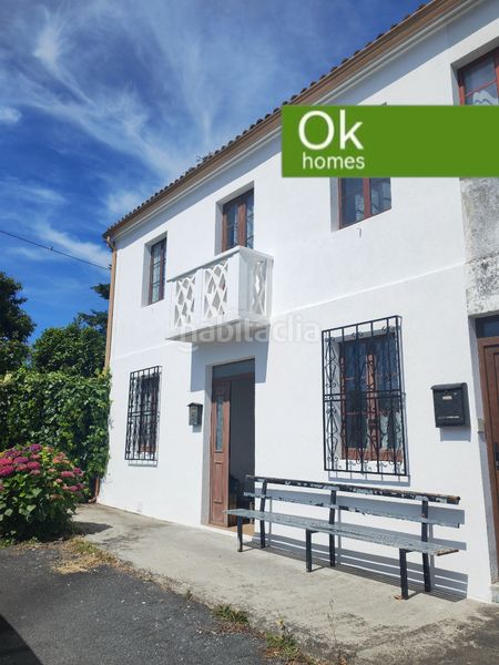 Foto e6078b0d-ef0d-4462-b9dd-0111fc24fcfc. Casa adossada amb xemeneia aparcament a Boimorto