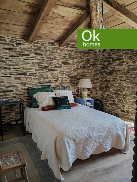 Foto 224f57d9-bd4d-4bc7-8133-437d10357660. Country house with fireplace heating in Castroverde