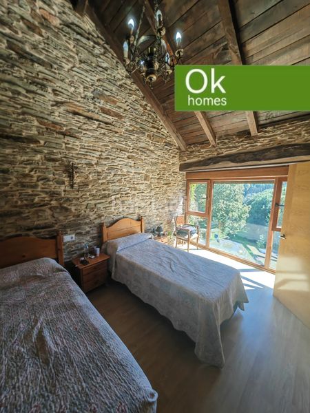 Foto f9f18f48-e5d4-47dd-9680-7af0e49bd56b. Country house with fireplace heating in Castroverde