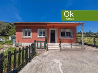 Maison à Curtis. Casia de planta baja, con terreno
