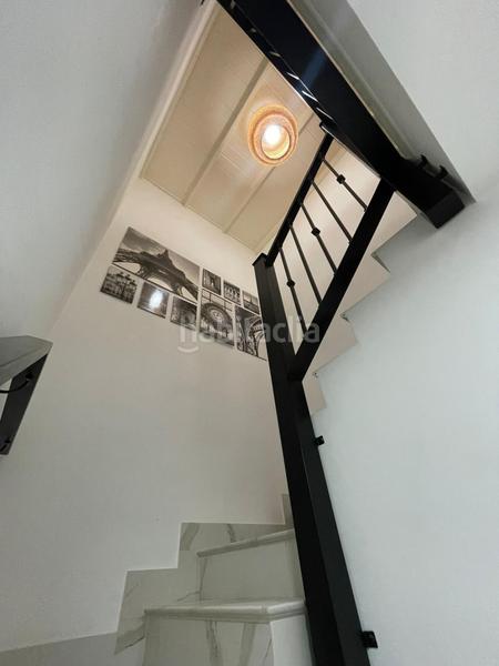 Foto 23b0bfbb-686b-41b1-9474-35617318f689. Casa adossada amb aparcament a Villanueva del Ariscal