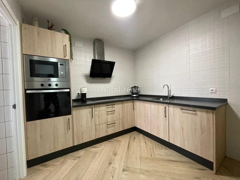 Foto d5073350-7f1c-4c0e-8f2c-3b11672c0ddd. Casa adossada amb aparcament a Villanueva del Ariscal