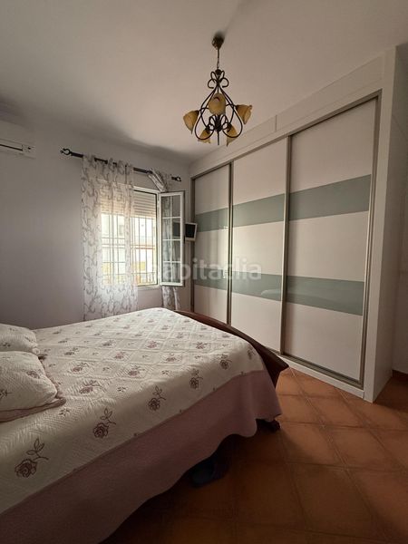 Foto 4d897846-c7a7-4c88-abab-3ad1d5ec8505. Casa amb aparcament a Puebla de Guzmán