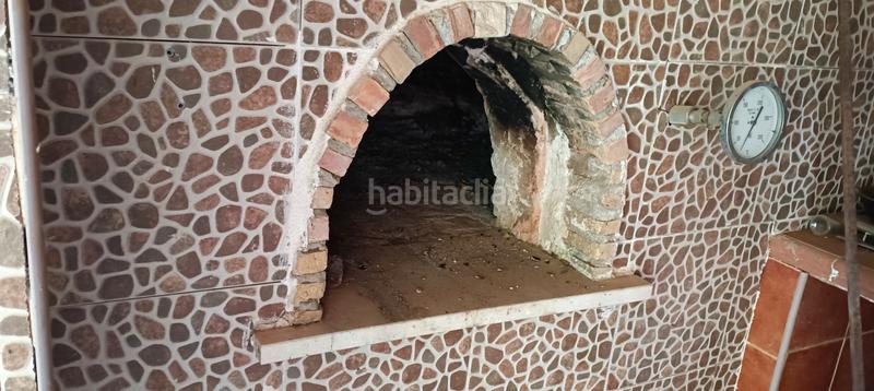 Foto d5edfa91-dc2d-44ad-80d0-cd2bf9542062. Chalet con camino riscaldamento parcheggio piscina in Cartagena