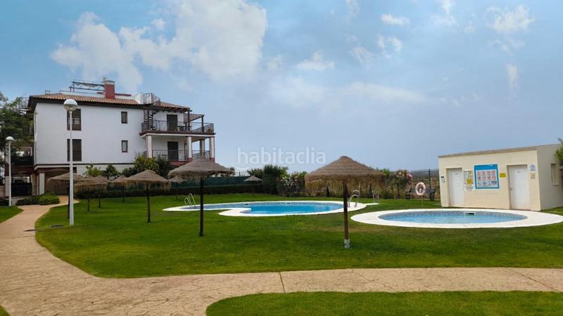 Foto b0948ae4-bbe2-410c-9e29-d63dc5e7bff8. Piccolo appartamento con parcheggio piscina in Costa Esuri Ayamonte