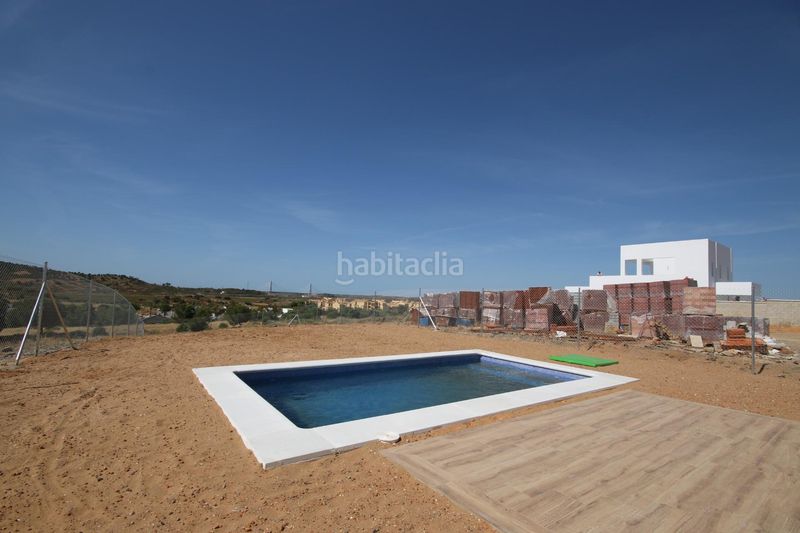 Foto 54a4ce6a-5ab4-44d9-b406-f71b77a7d745. Casa amb aparcament piscina a Costa Esuri Ayamonte