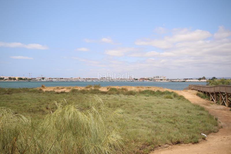 Foto 24cf0267-8cbd-40a7-a73d-014cd68e909d. Chalet vivienda adosada en barriada de canela en Isla Canela Ayamonte