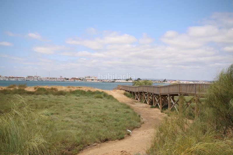 Foto 753e01d7-8c7d-4da7-a424-45faab2e13b0. Chalet vivienda adosada en barriada de canela en Isla Canela Ayamonte