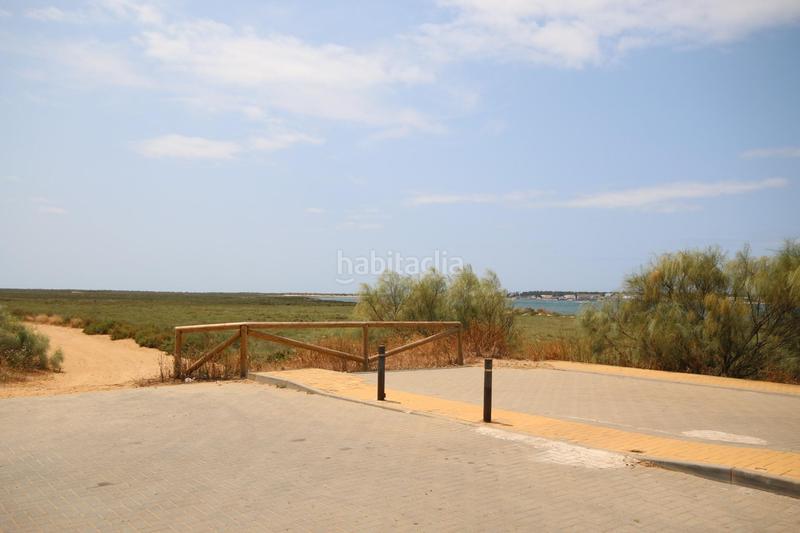 Foto 91a6e50b-dd52-4ec7-ac1b-67a88db6ae04. Chalet vivienda adosada en barriada de canela en Isla Canela Ayamonte