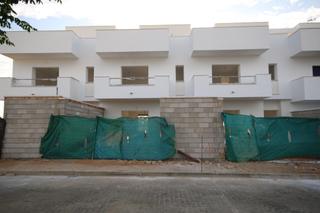 Chalet en Isla Canela. Vivienda adosada en barriada de canela