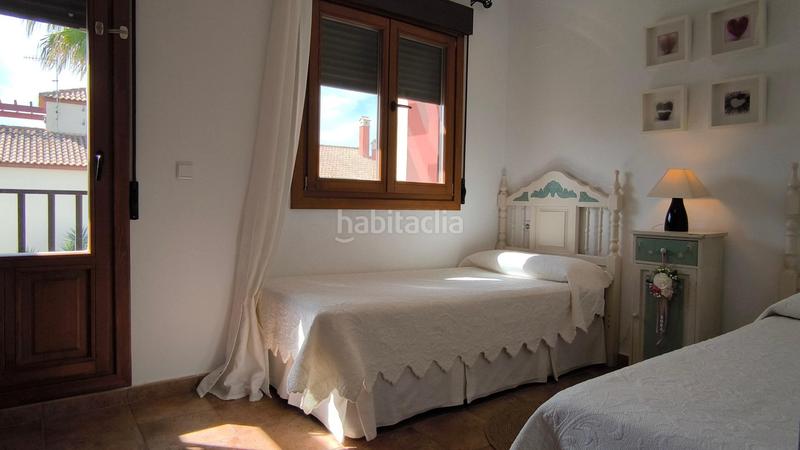 Foto 62237257-dd48-4c50-8d8d-2a93cb87f19e. Casa adossada amb aparcament piscina a Costa Esuri Ayamonte