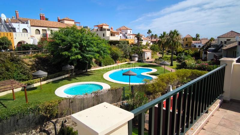 Foto b8ba41ab-f5f2-44df-be28-22f90a1261f4. Casa adossada amb aparcament piscina a Costa Esuri Ayamonte