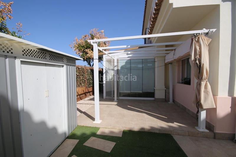 Foto 1f27e0ad-3630-4d88-ae71-6b0796709c25. Reihenhaus mit parking pool in Costa Esuri Ayamonte