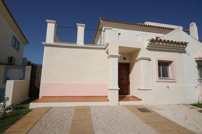 Foto ef1d2ee4-2890-4106-9f44-6d3ee23e9a77. Reihenhaus mit parking pool in Costa Esuri Ayamonte