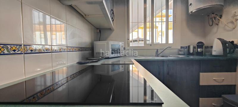 Foto 6be90122-0460-4268-8baa-f8a17398d33e. Erdgeschoss mit heizung parking pool in Islantilla golf Islantilla