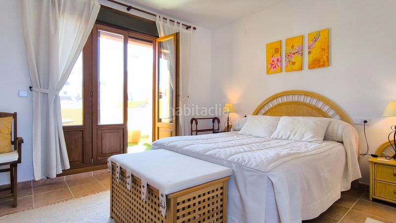 Foto ed1932e6-6942-440e-82a9-5606bad88532. Duplex con parcheggio piscina in Costa Esuri Ayamonte