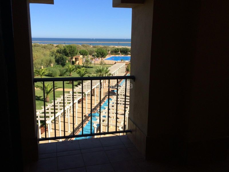 Foto 54c5e040-1a43-4e39-9583-2b46ba0b40f3. Location appartement avec parking piscine dans Isla Canela Ayamonte
